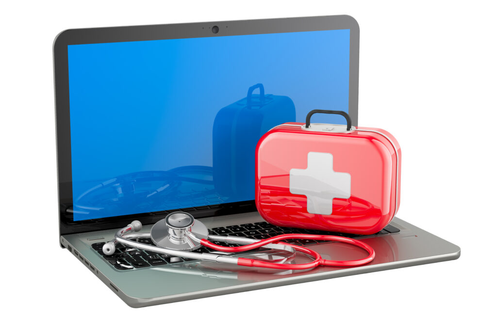 Laptop with stethoscope and first aid kit, 3D rendering isolated